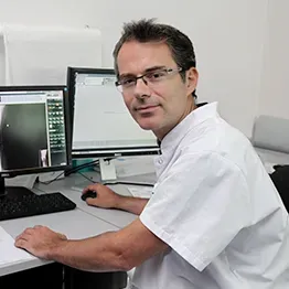 Dr Xavier COUTOULY